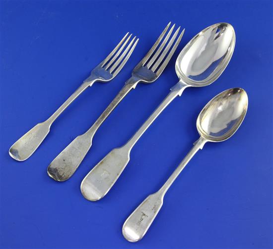 A Victorian matched part suite of silver fiddle pattern flatware,